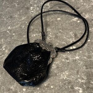 Adorable Brighton evening bag with magnetic closure.
